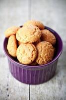 meringue almond cookies in bowl photo