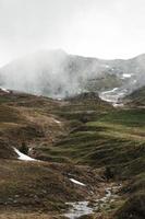 Mountain covered with fog photo