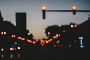 Defocused city street at night photo