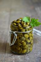 Capers in a jar. photo