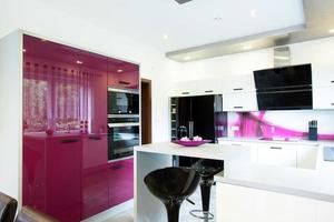 Modern kitchen with purple elements