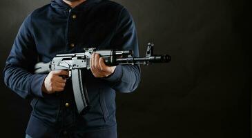Terrorist is holding AKM 47 photo