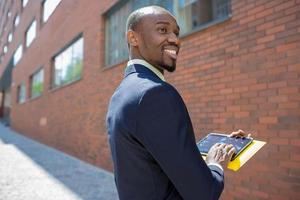 The business black man with laptop photo