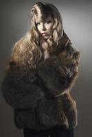 fashion woman with elegant fur photo