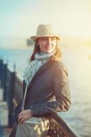 Beautiful woman in hat and scarf photo