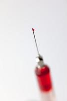 syringe full of blood photo