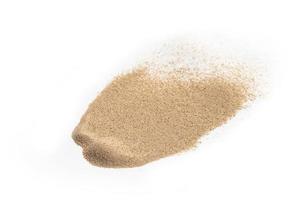 Dry sand isolated on white photo