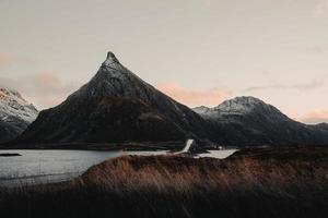 Mountain behind a bridge photo