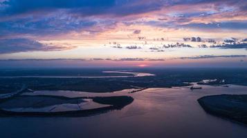 Sunrise over the coastline photo