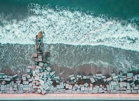 Aerial photography of stone bricks on seashore photo