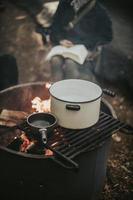 Cooking pots above a campfire