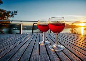 Two red wine glasses photo