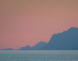 Silhouette of mountain range photo