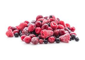 Frozen berries on white background photo