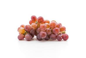 Fresh red grapes on white background photo