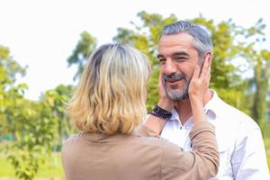 Couple embracing in a park  photo