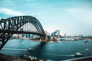 Boats pass through city photo