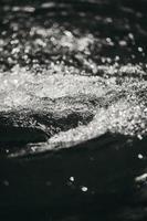 Selective focus photography of swirling water photo