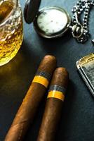 Cuban cigars with cognac and humidor