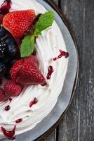 Homemade pavlova meringue with summer fresh berries