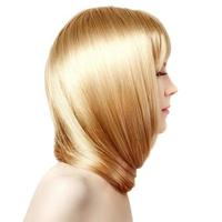 Hair. Beauty young woman with luxurious long blond hair.