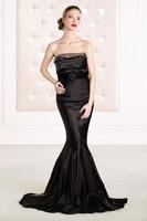 Beautiful woman wearing black elegant dress