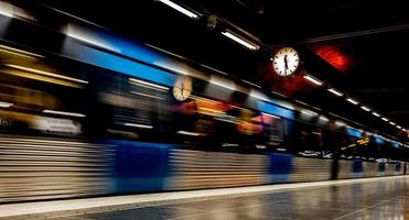 Blurred image of a moving subway train photo