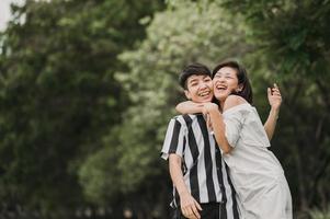 Happy Asian lesbian LGBT couple in love