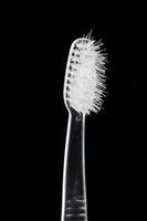 Old toothbrush. isolated photo
