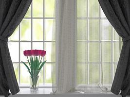 tulipanes en el alféizar de una ventana. foto