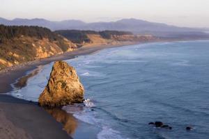 Rock formation on seashore photo