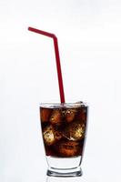 A soda with straw on white background