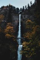 bridge near waterfalls photo