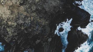 Top view photo of a cliff at the seaside