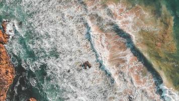 Aerial view of ocean waves photo