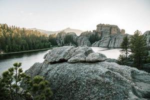 Rock formations near forest photo