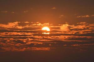 Red sunset with clouds photo