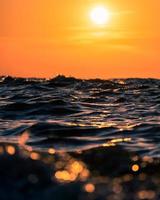 Waves at sunset photo