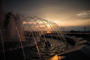 City fountain at sunset. photo