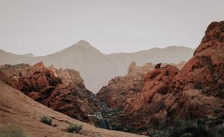 Brown rock formations in the desert photo