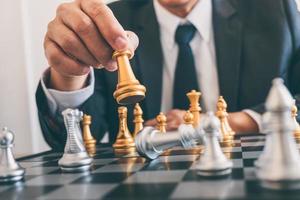 Businessman playing chess  photo