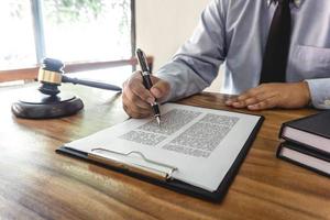 Male lawyer working on documents  photo