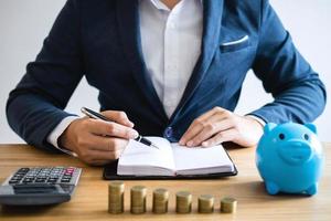 Businessman working with documents at desk photo