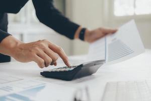 Close-up of accountant at work photo