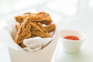 Fried chicken wings with sauce photo