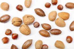 A variety of nuts on a white background photo