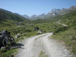 Dirt road in the mountains photo