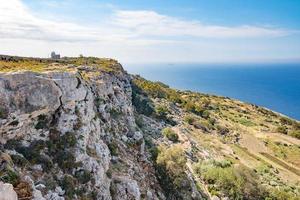 Rocky cliffs in Malta photo