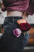 Roses inside a person's pocket photo