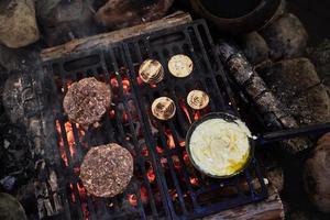 Two patties on the grill photo